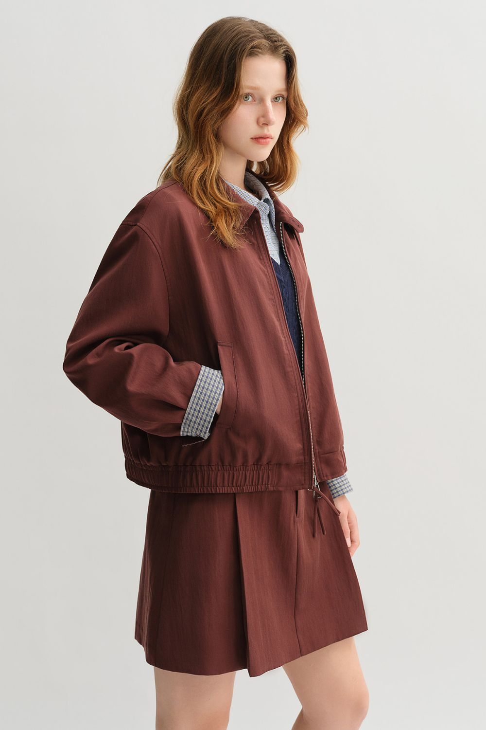 Auvrelia Stylish Jacket and Pleated Skirt Ensemble